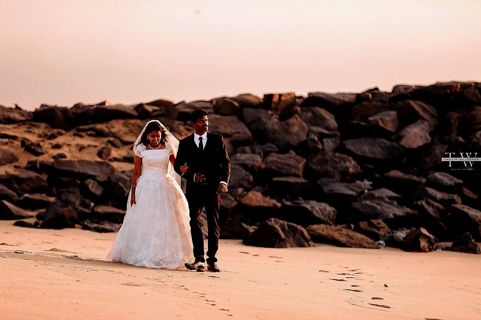 Olivia & Kingston — beach wedding portrait by Thulir Weddings