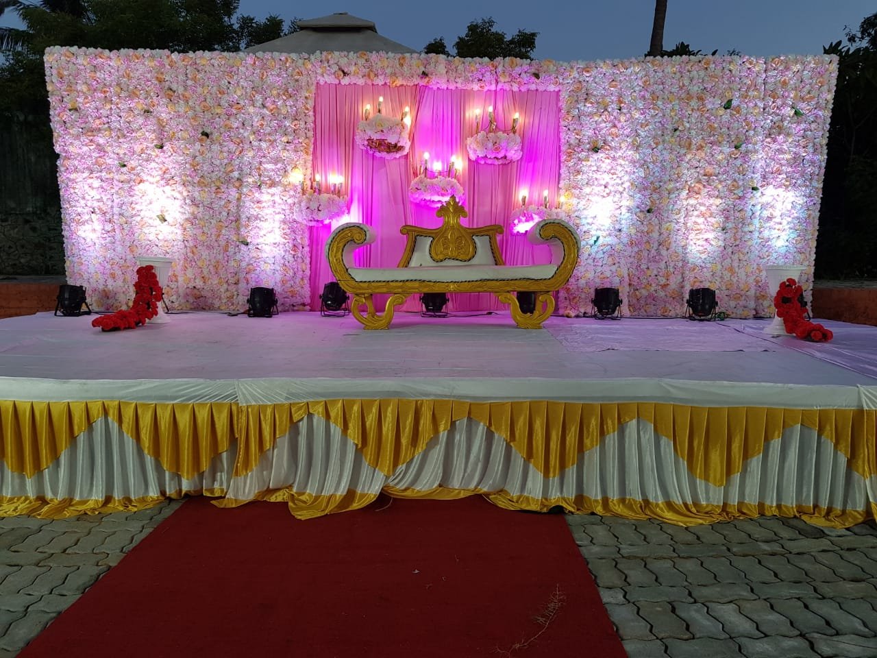 Outdoor wedding stage floral decor