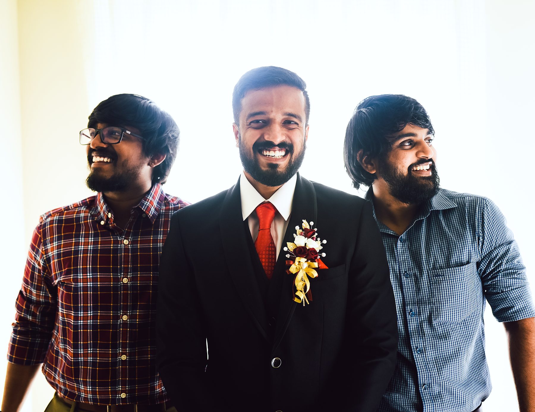 Groom with friends candid moment wedding
